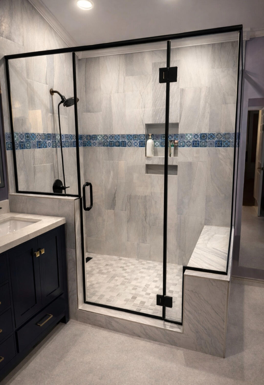 Frameless glass shower door with matte black hardware installed by Crystal Vision Glass in New Jersey