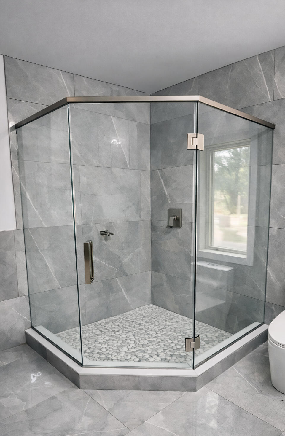 Frameless neo-angle glass shower door installation by Crystal Vision Glass in New Jersey