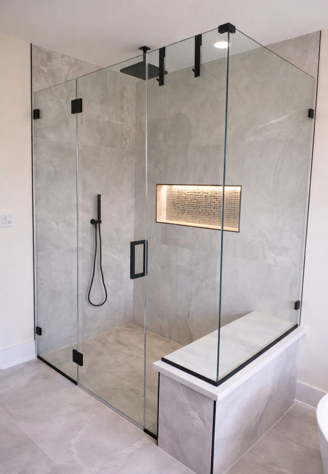 Custom frameless glass shower enclosure with matte black hardware installation New Jersey Crystal Vision Glass