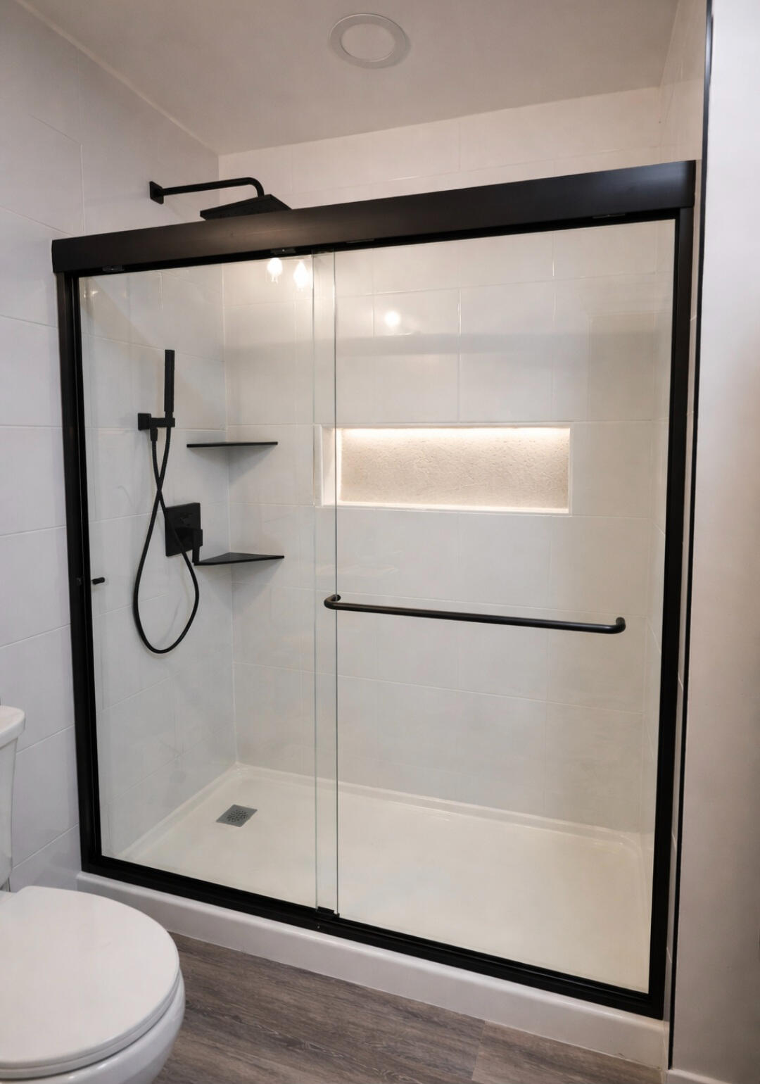 Frameless inline shower door